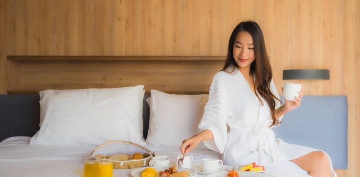 portrait-beautiful-young-asian-woman-happy-enjoy-with-breakfast-bed-bedroom-2